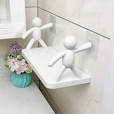 Creative Wall Shelf with Human Figurine Support – Modern Decorative Storage Rack