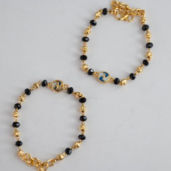 Embrace the beauty of traditions with the Swastik Baby Nazaria Gold Bracelet .Bracelet KBLT-0732 (1-3 yrs)